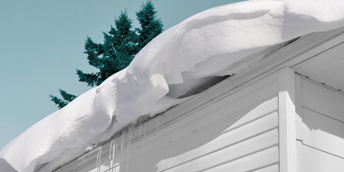 How Snow and Ice Impact Your Roof Featured Image